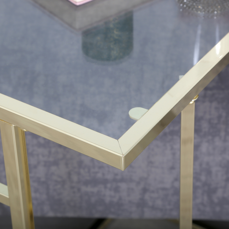 The C-shaped gold Sofa Table