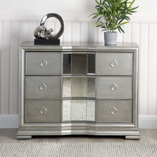 The grey three-drawer chest